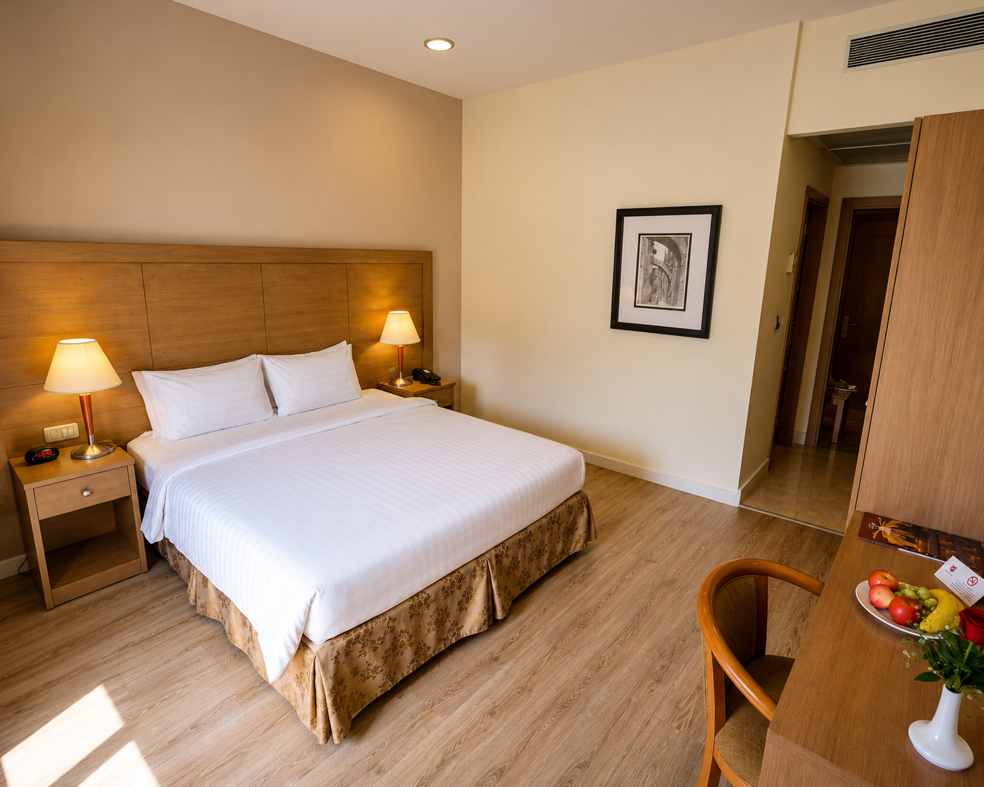 Family Suite with large bed and warm tones